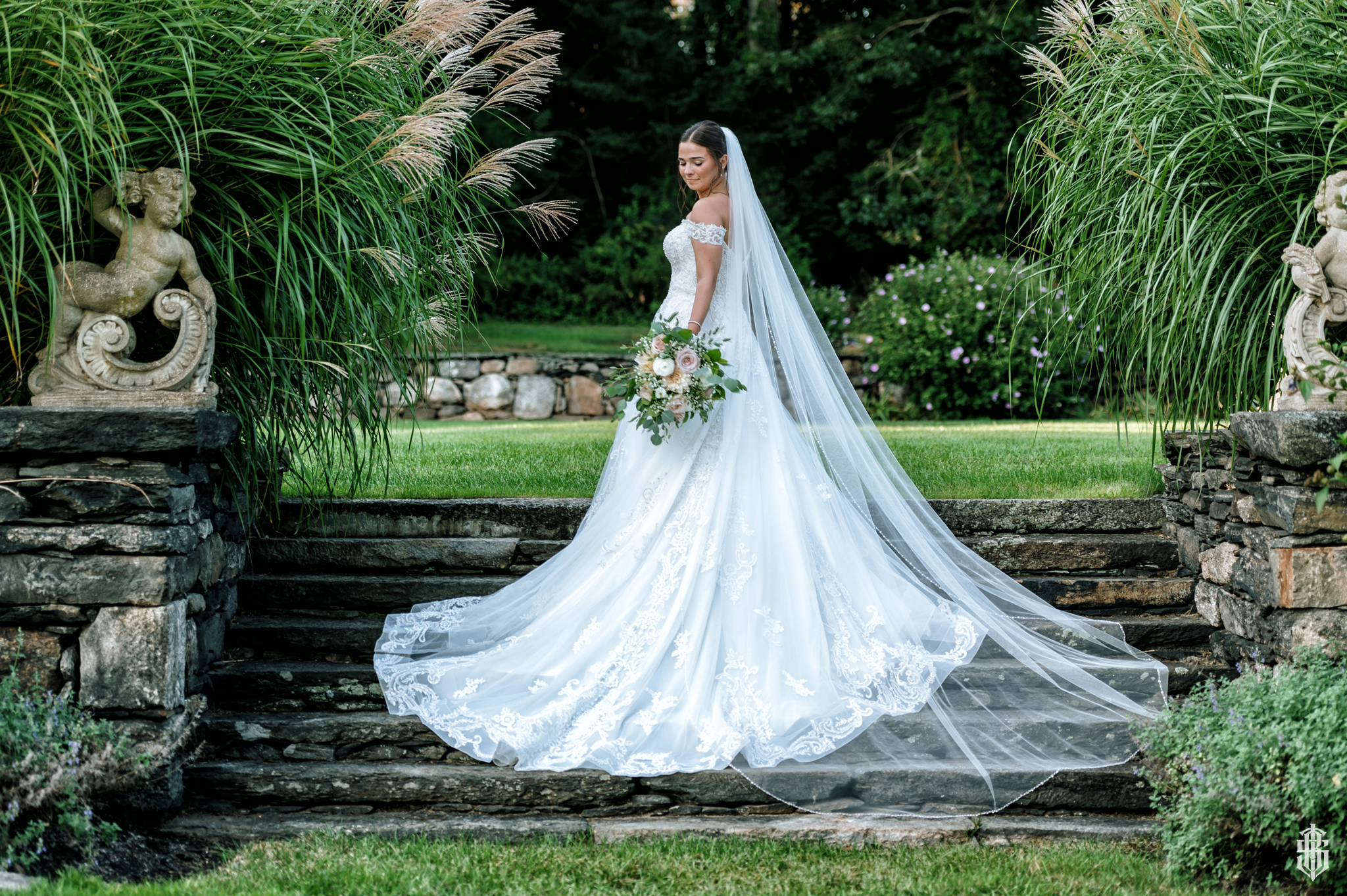 Bridal party walking across the castle grounds at Saint Clement's Castle, Portland CT by Bruno Sauma