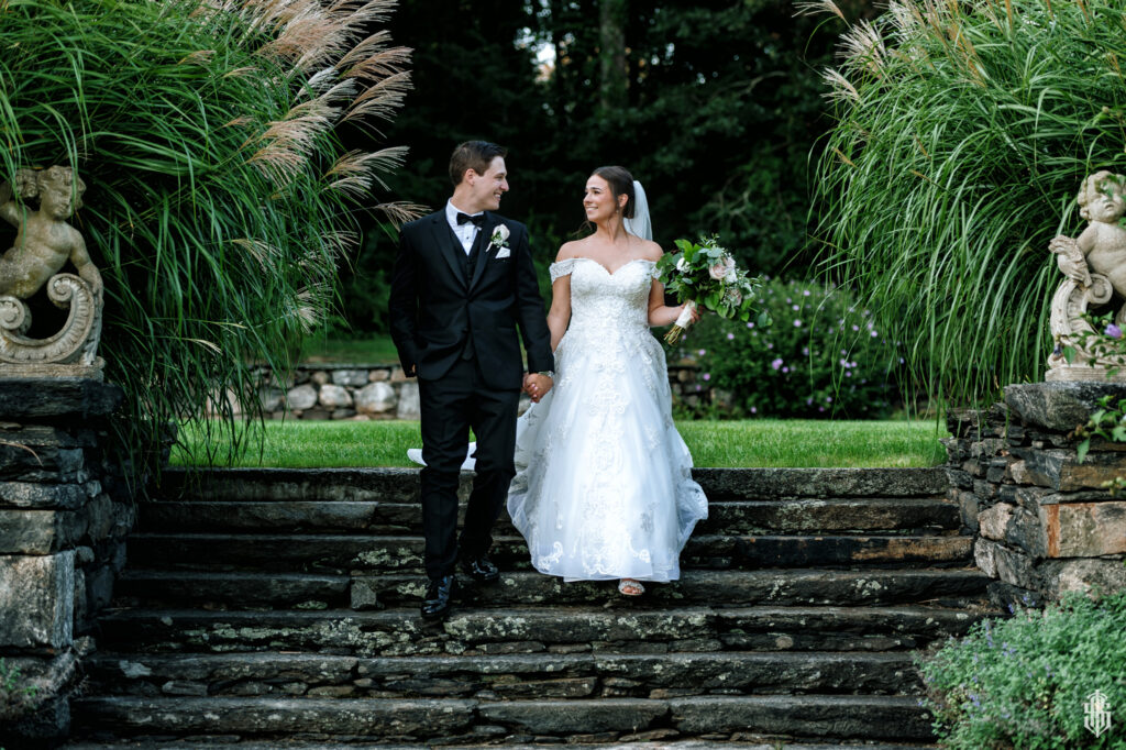 Bridal party on the castle grounds captured by Saint Clement's Castle wedding photographer