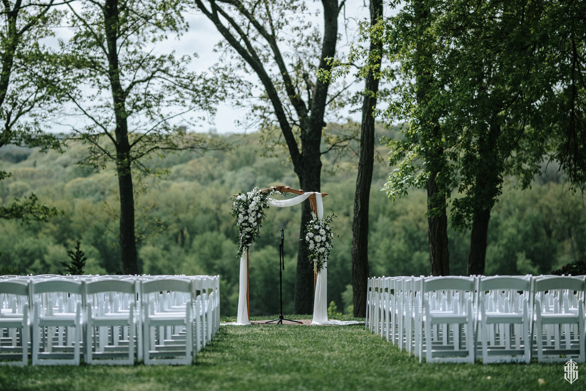 Outdoor wedding ceremony setup with chairs and natural backdrop at a Connecticut venue