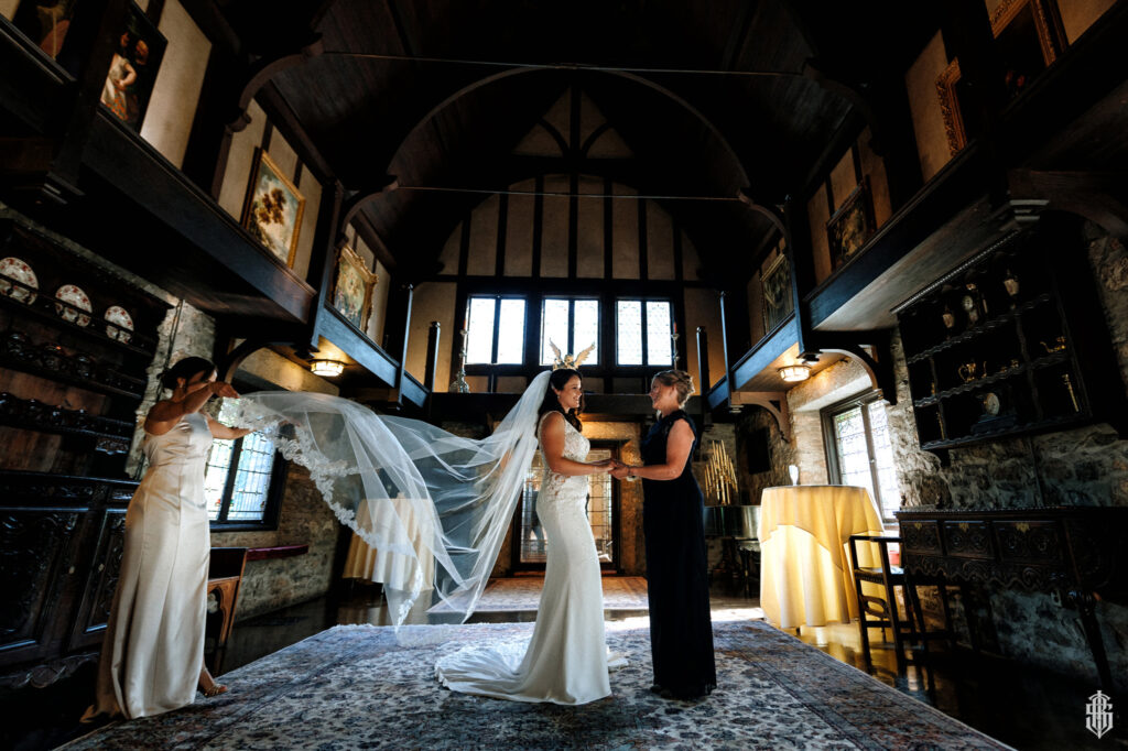 Waterford Room chandelier detail by Connecticut castle wedding photographer