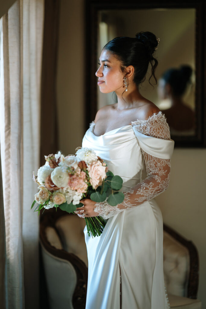 Elegant bridal portrait in the castle interior by Saint Clement's Castle wedding photographer