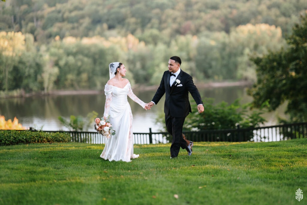 Sunset portrait along the Connecticut River by Connecticut castle wedding photographer Bruno Sauma