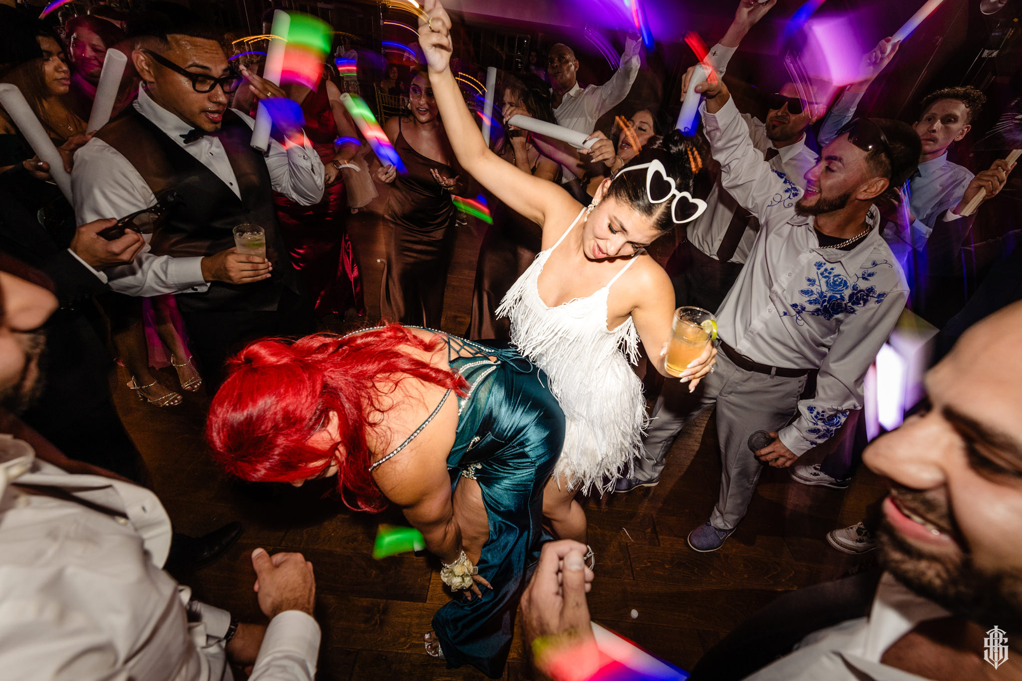 Joyful reception moments under the chandeliers at Saint Clement's Castle, Portland CT by Bruno Sauma