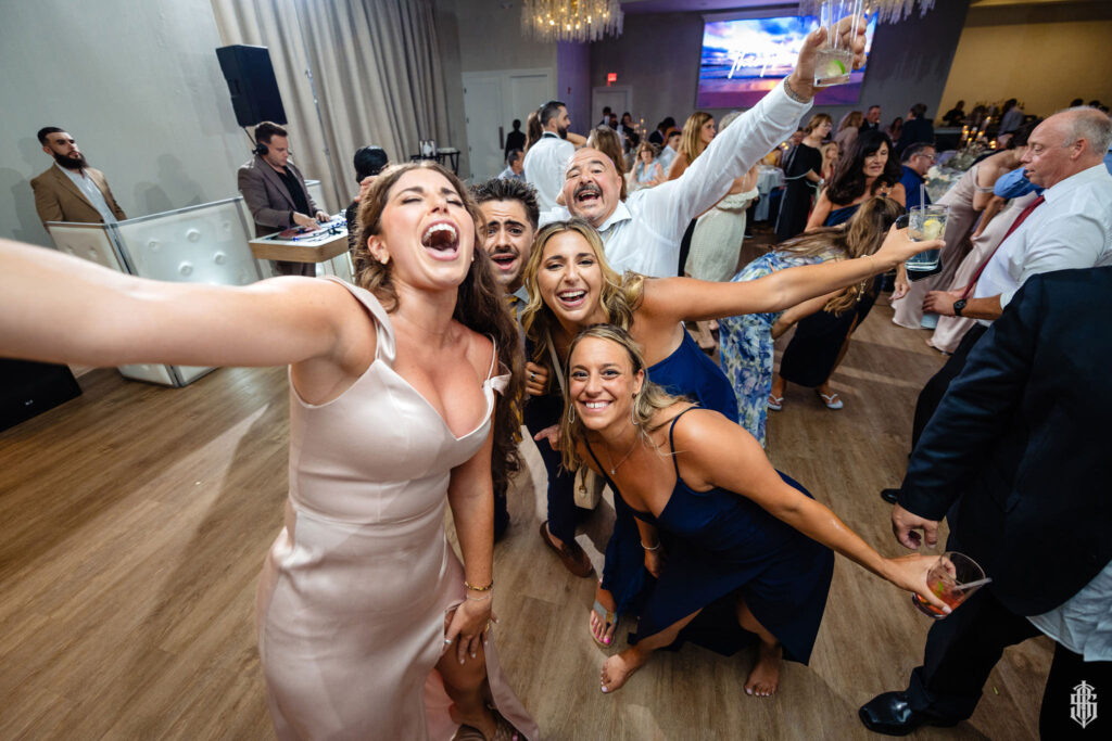 Coastal wedding portraits at Tyde at Walnut Beach in Connecticut