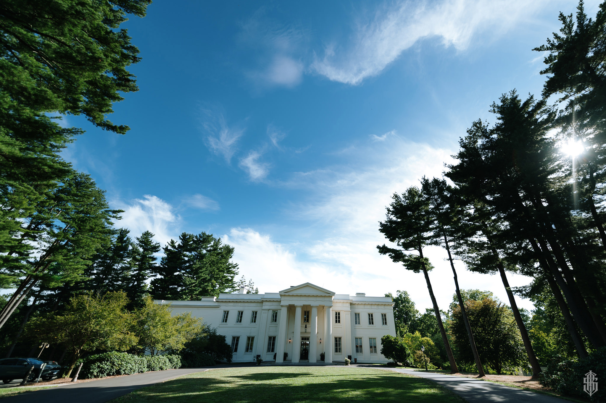Historic Beaux-Arts facade of Wadsworth Mansion glowing in afternoon light