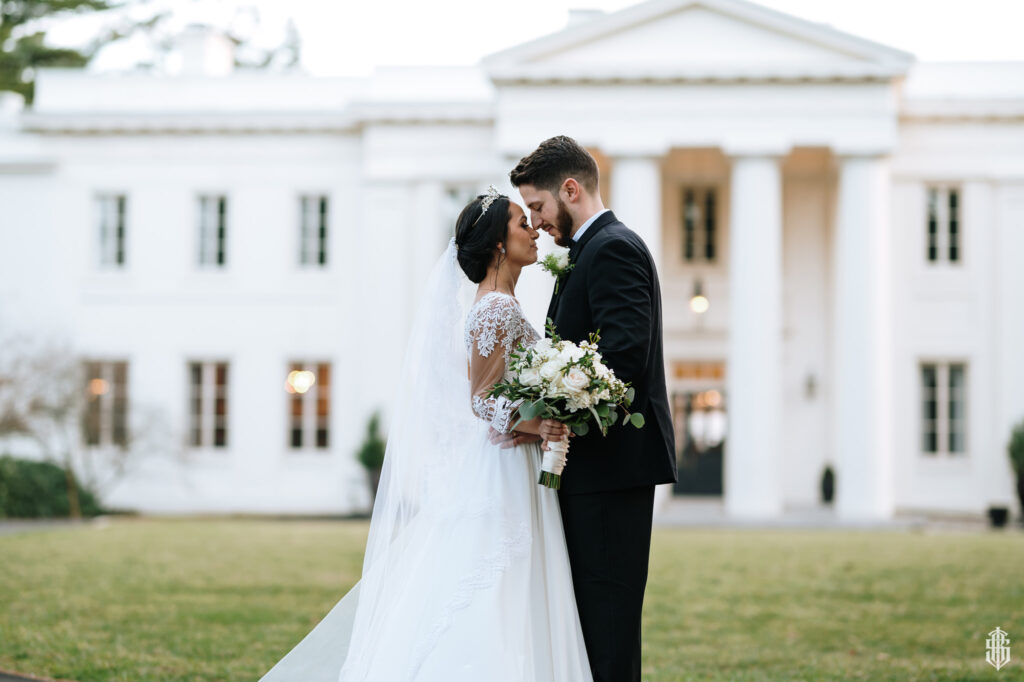 Joyful celebration on the dance floor with dramatic uplighting