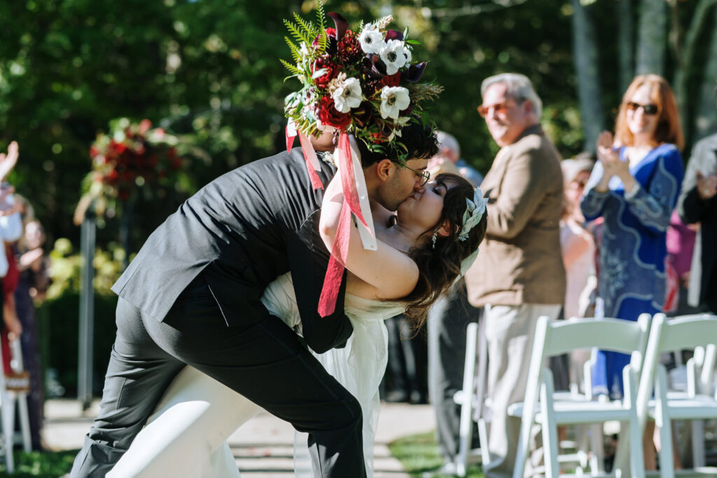After ceremony kiss at Bill Miller's Castle - Bruno Sauma Photography 