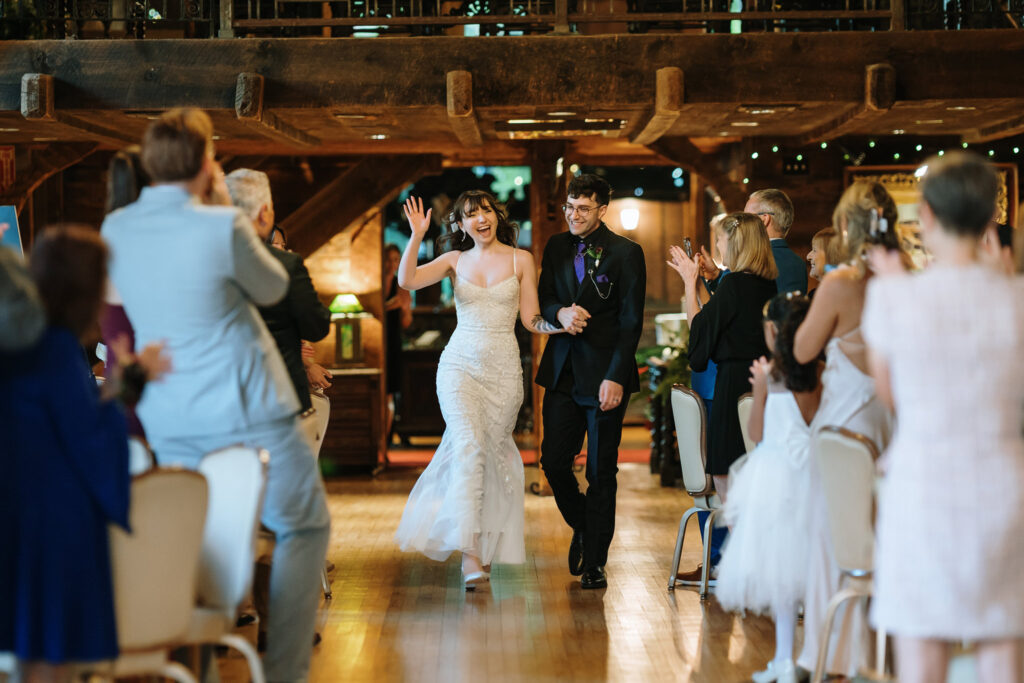 Bride and groom entrance at reception festivities at Bill Miller's Castle - Bruno Sauma Photography 