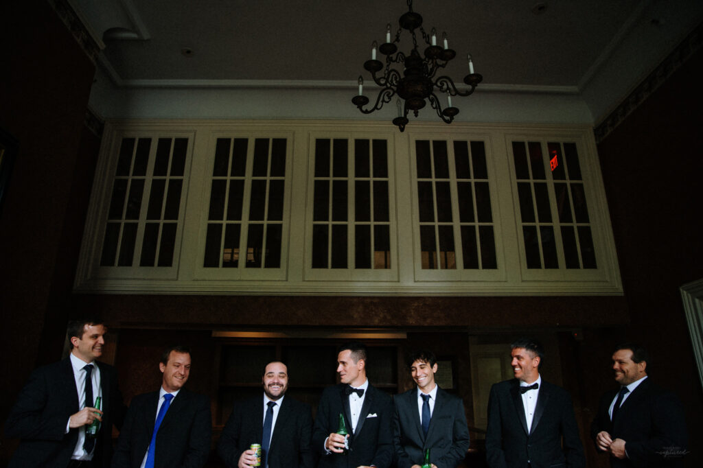 Groomsmen and groom during the wedding toast at Wadsworth Mansion - Bruno Sauma Photography