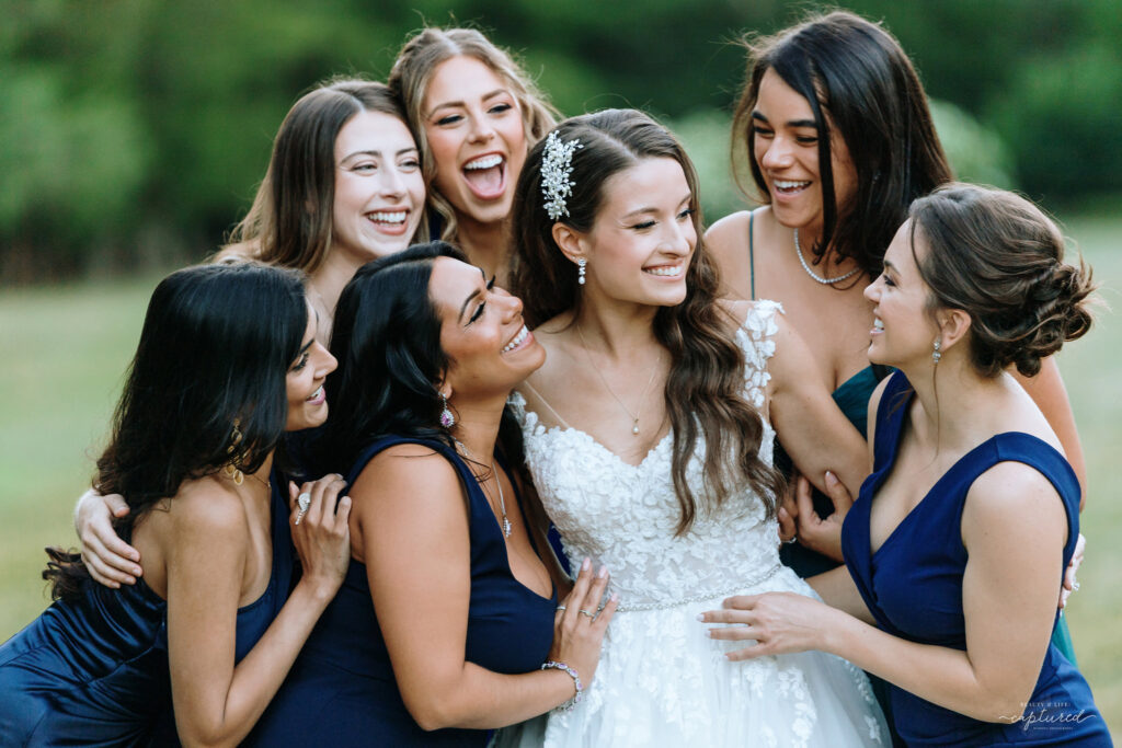 Bridesmaids celebrating with bride at a Wadsworth Mansion wedding